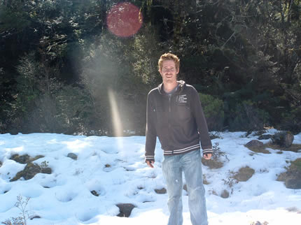 Paul standing on the snow